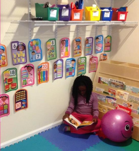 Child reading in a colorful classroom reading corner